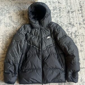 Nike puffer Jacket. My 15 year older old son wore for one season.